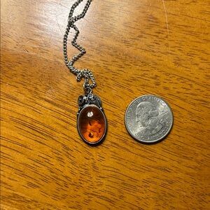 Elegant Silver and Amber Pendant Necklace